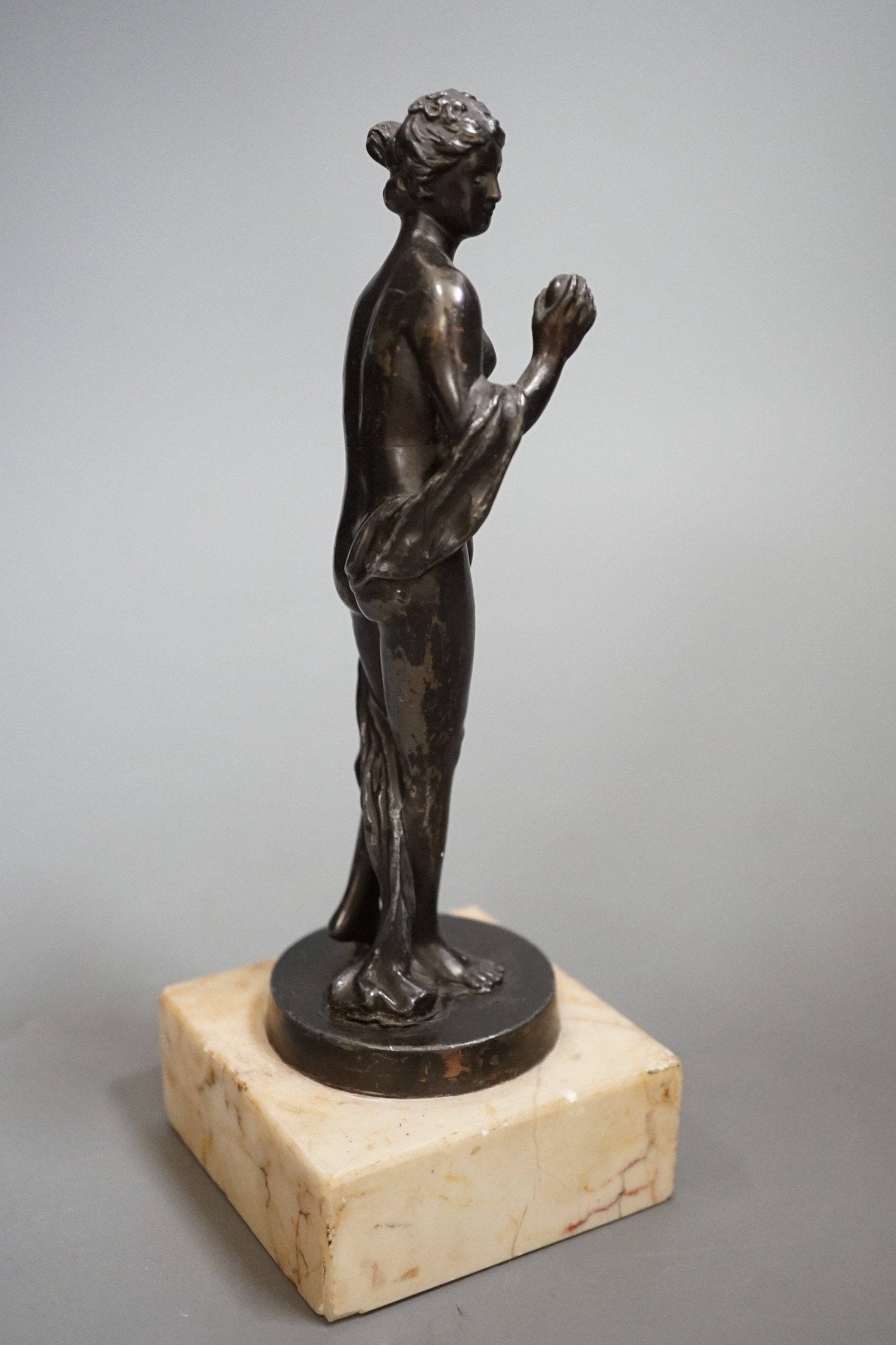 A bronzed spelter figure 'Eve', 20cm high